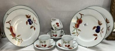 A quantity of Royal Worcester Evesham vale dinner plates, cups & saucers