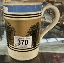 An antique Mocha ware mug
