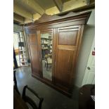A large sectional wardrobe with mirror centre section 188 x 57 x Height 183cm