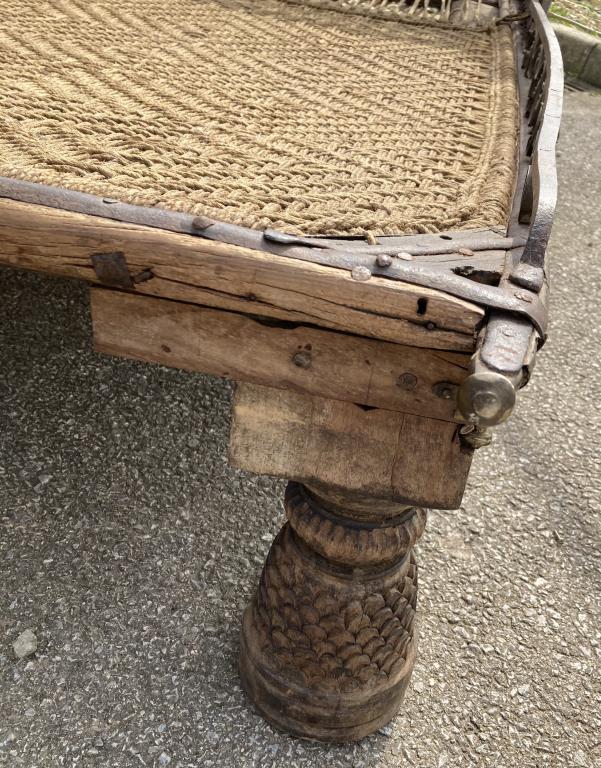 An Oriental style bed base 19th century with rope woven base and decorative metal rails and - Image 2 of 4