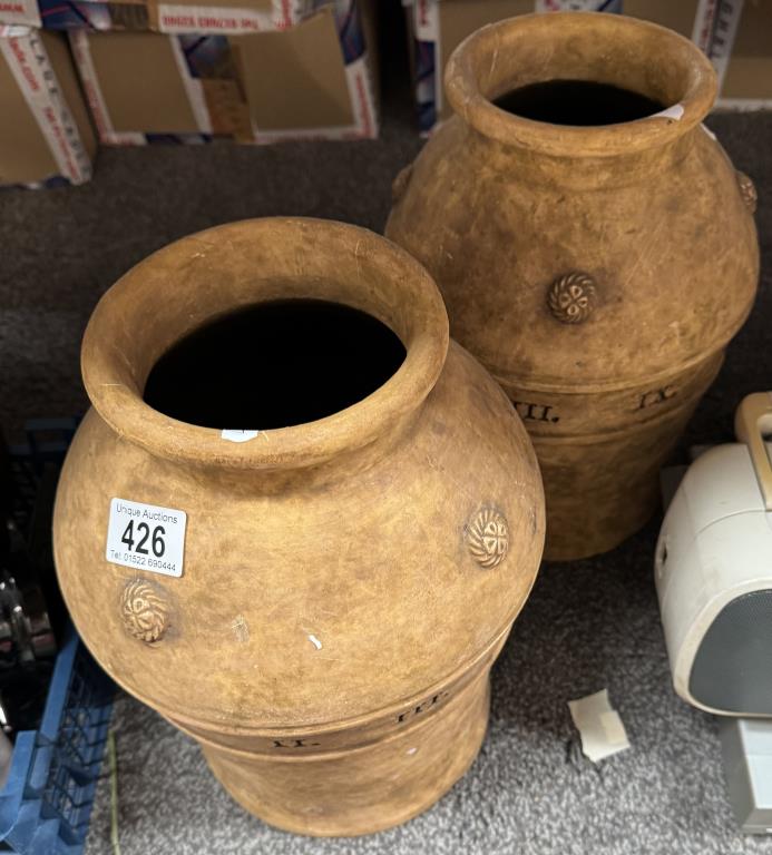 A pair of unusual ceramic vases featuring Roman numerals. COLLECT ONLY