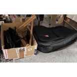 A quantity of music stands & an empty 'Soft' guitar case & guitarist foot rest