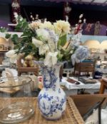 A blue & white vase with Dutch scenes