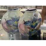 A pair of lovely Tupton ware moon vases