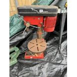 A heavy-duty drill press