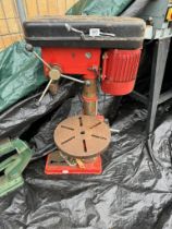 A heavy-duty drill press