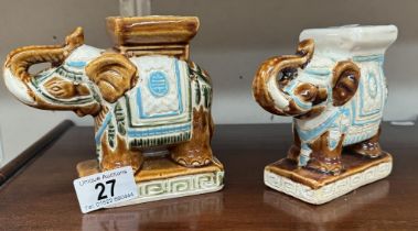 2 Pottery elephant plant stand ornaments.