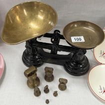 A set of vintage kitchen scales & weights