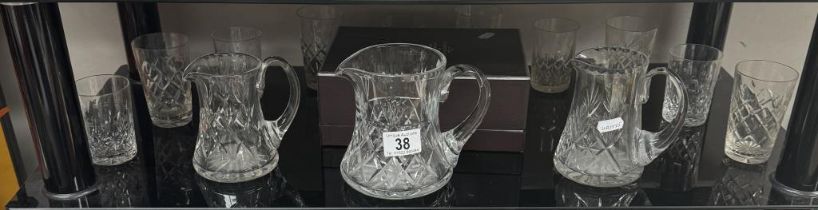 A quantity of cut-glass jugs & glasses