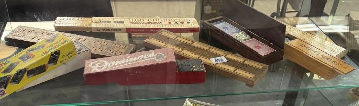 A quantity of cribbage boards, dominoes & playing cards