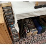 A quantity of CD's, DVDs etc with racks & cases