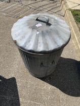 A vintage metal dustbin & lid
