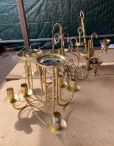 A pair of brass coloured chandelier style light fittings plus 2 others