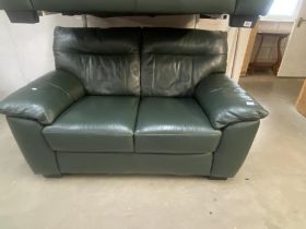 A green leather 2 seat settee