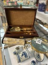 A box set of a magnifying glass with a letter knife & An unboxed magnifying glass