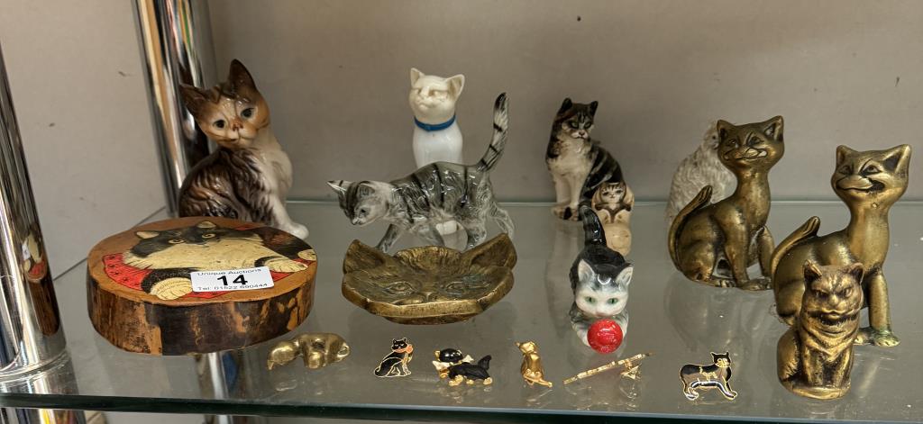 A mixed lot of cat figures including brass & A quantity of cat pin badges etc