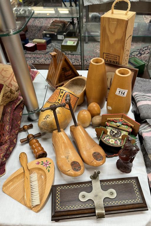 An inlaid tie press cuckoo clock, A Swiss cottage money box & other wooden items