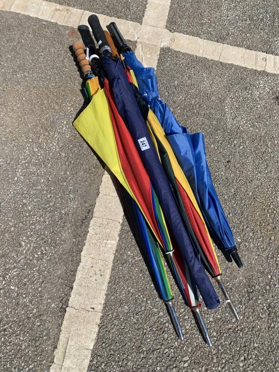 A selection of six golf style umbrellas