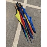 A selection of six golf style umbrellas