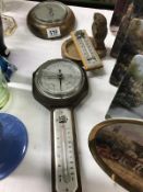 A barometer plus other items