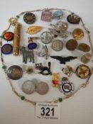 A mixed lot of badges, silver thimble, brooch etc., (approximately 28 pieces).