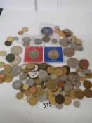 A mixed lot of old coins including crowns.