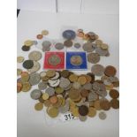 A mixed lot of old coins including crowns.