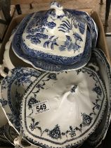 A miscellaneous box including tureens, plates and bowls.