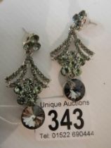 A pair of diamonte pendant earrings.