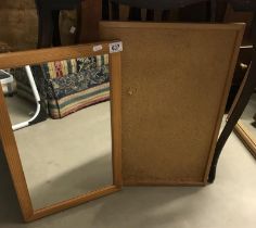 A mirror and a pin board