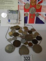 A mixed lot of coins including £5 coin and six euro note etc.,