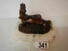 A good quality horse on a marble base paperweight.