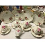 Tea set with 5 cups, 4 saucers and 6 tea plates