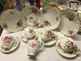 Tea set with 5 cups, 4 saucers and 6 tea plates