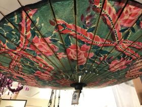 Parasol with pink and green design