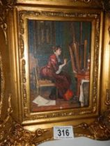 A gilt framed study of a female artist, signed.