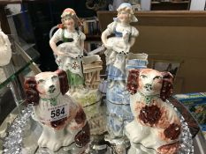Two Staffordshire dogs and Two figurines