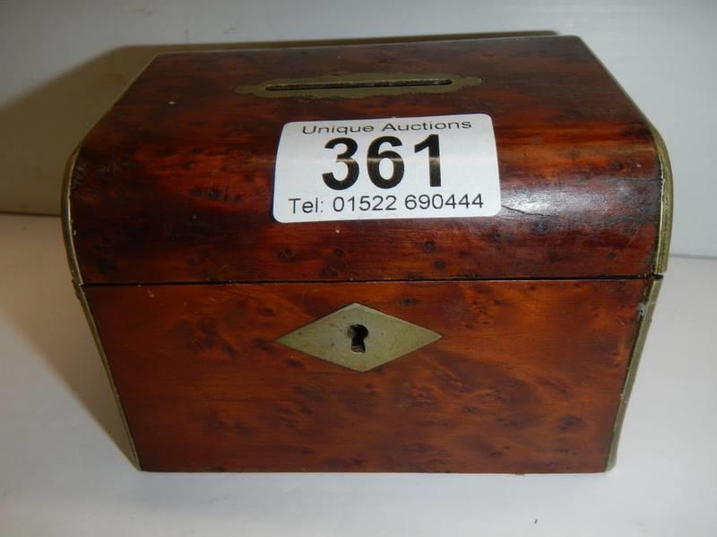 An early 20th century maple money box. - Image 3 of 3