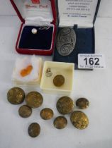 A Celtic brooch, military buttons etc.,