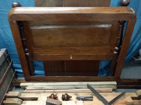 A Victorian mahogany half tester bed