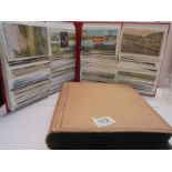 Two albums of approximately 350 mainly topographical postcards.