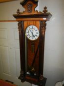 A mahogany single weight Vienna wall clock, COLLECT ONLY.