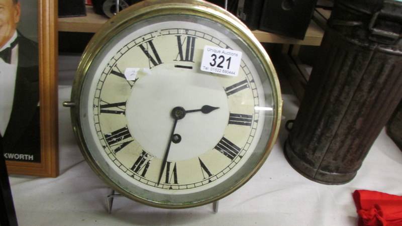 A brass ship's clock.