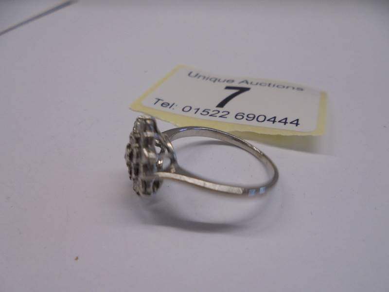 A three quarter carat white gold floral diamond ring, size N, 2.75 grams. - Image 2 of 2