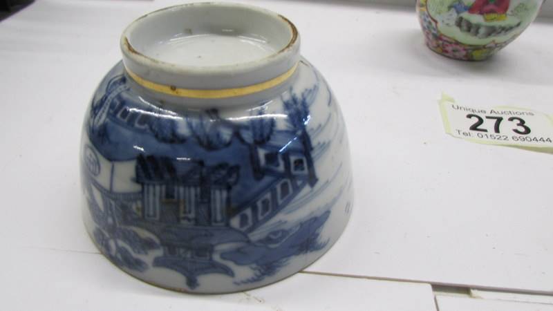 A pair of 19th century Chinese tea bowls (one with early stapled repair) & a miniature Chinese vase. - Image 5 of 8