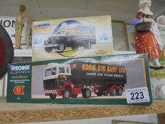A boxed Corgi Classics 98454 Mack B Series van 'Wilton Farm' and an Eddie Stobart Ford trailer.