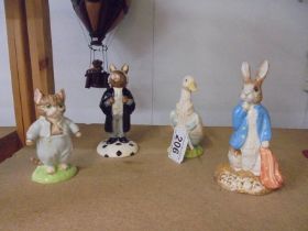 Three Beswick and one Royal Doulton Beatrix Potter figures.