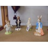 Three Beswick and one Royal Doulton Beatrix Potter figures.