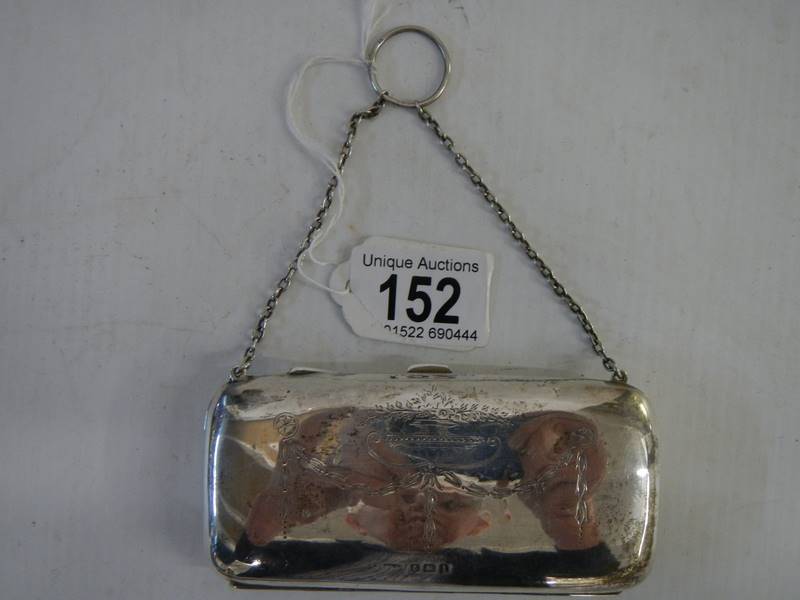 A ladies silver evening purse.