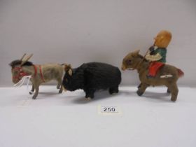 A Japanese clockwork bear and two clockwork donkey's. not working.